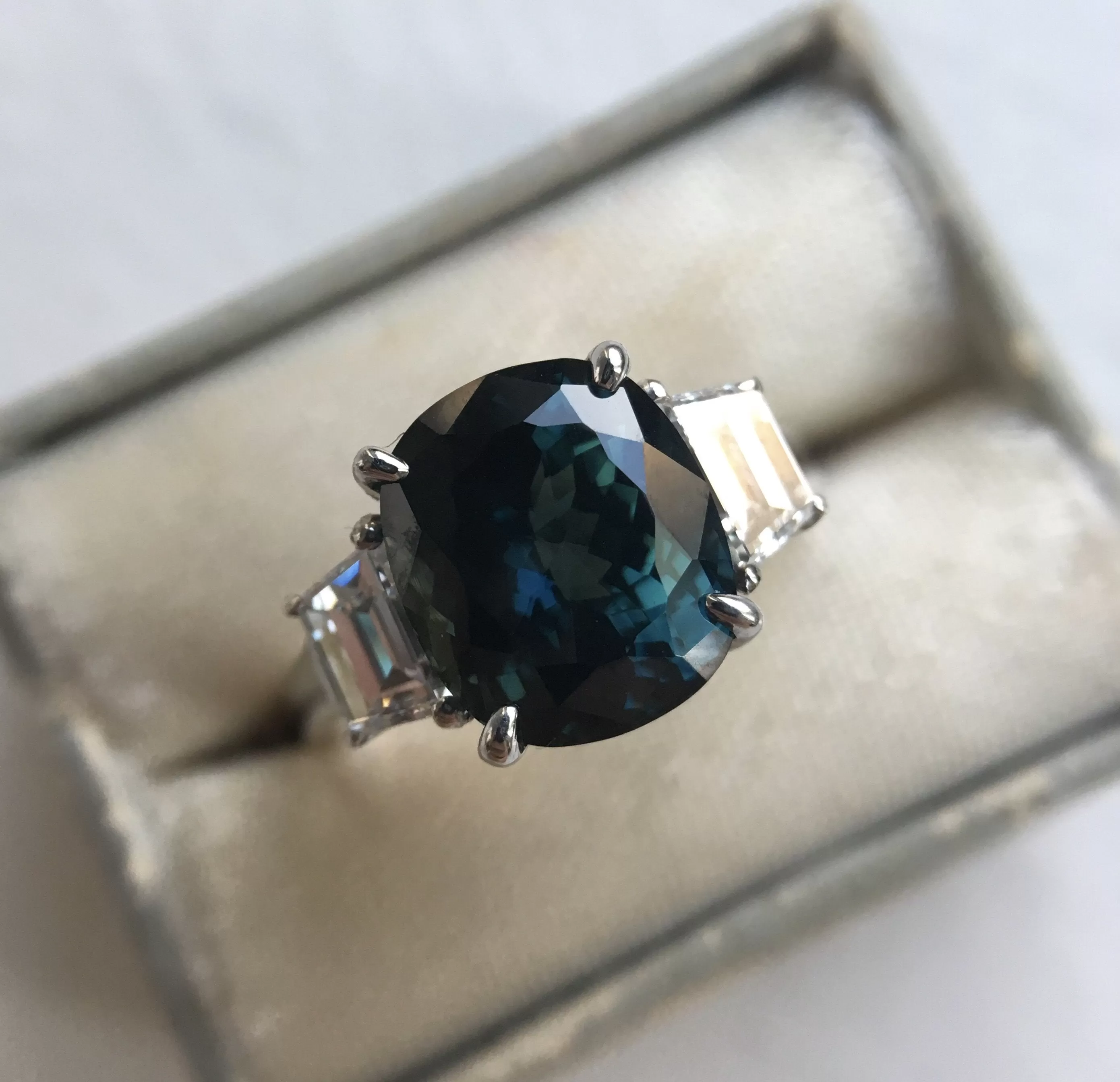 4.41ct Teal Crown Jubilee Cut Cushion Sapphire and Diamond Three Stone Ring