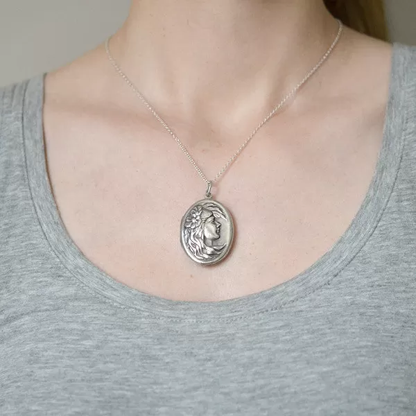 Art Nouveau Sterling Silver Repousse Woman Locket